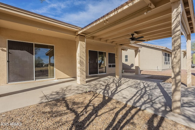 view of patio / terrace featuring ceiling fan