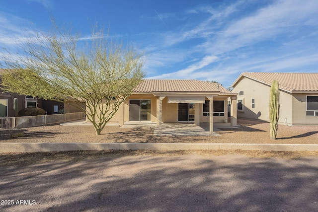 back of house featuring a patio