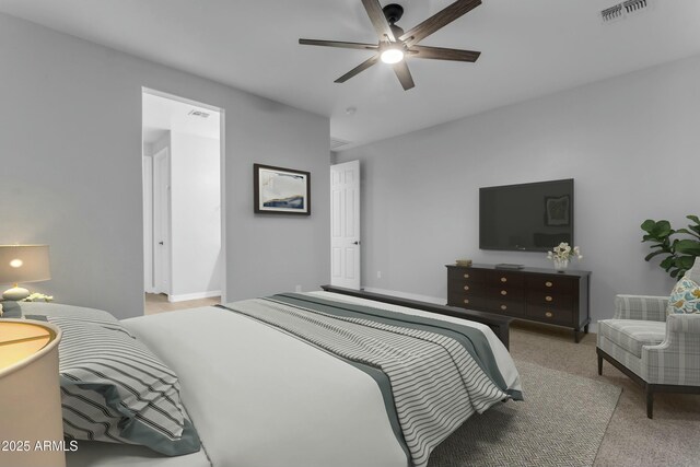 unfurnished room featuring visible vents, baseboards, ceiling fan, and carpet flooring