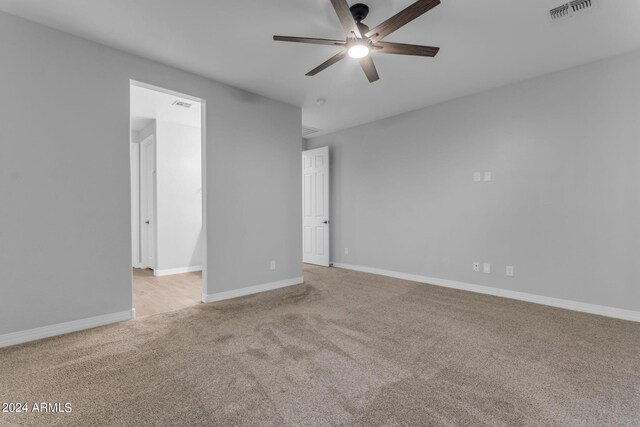 bathroom with toilet and baseboards