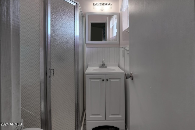 322 N Flynn Jans Ct, Pearce, AZ 85625 - bathroom featuring a shower stall, wainscoting, and vanity
