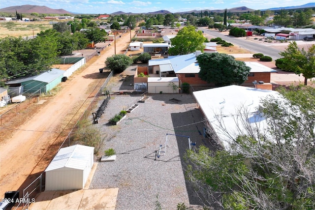 322 N Flynn Jans Ct, Pearce, AZ 85625 - aerial perspective of suburban area featuring a mountainous background