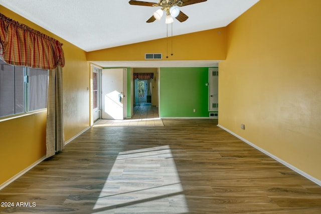322 N Flynn Jans Ct, Pearce, AZ 85625 - spare room with lofted ceiling, ceiling fan, baseboards, and wood finished floors