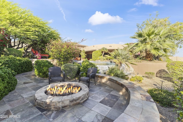 13249 E Summit Dr, Scottsdale, AZ 85259 - view of patio featuring an outdoor fire pit