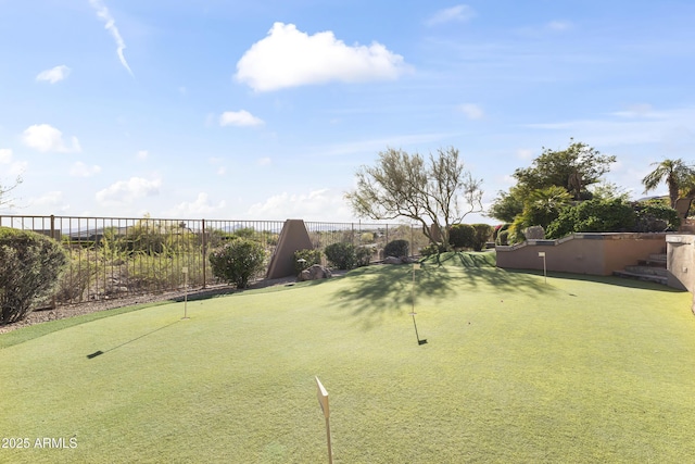 13249 E Summit Dr, Scottsdale, AZ 85259 - view of yard with fence and an area to practice putting