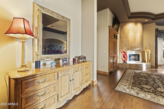 13249 E Summit Dr, Scottsdale, AZ 85259 - hall featuring dark wood-type flooring, baseboards, and a tray ceiling