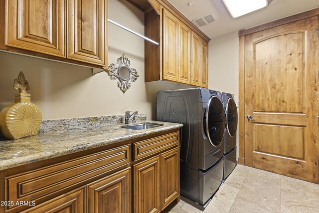 13249 E Summit Dr, Scottsdale, AZ 85259 - washroom featuring separate washer and dryer and cabinet space