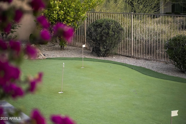 13249 E Summit Dr, Scottsdale, AZ 85259 - surrounding community with fence and an area to practice putting