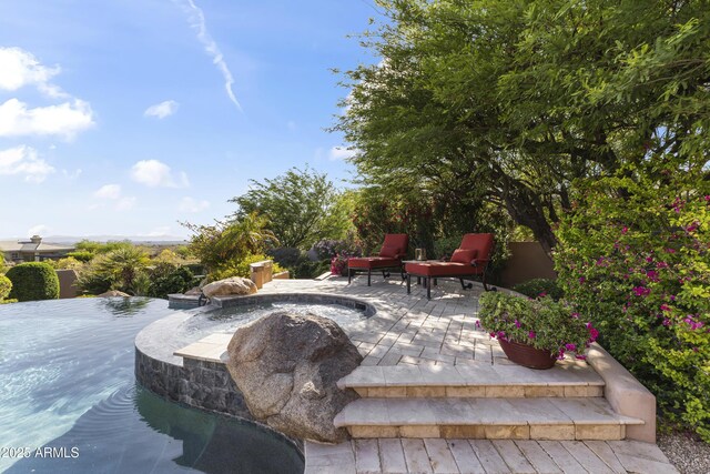 13249 E Summit Dr, Scottsdale, AZ 85259 - view of patio / terrace with a jacuzzi