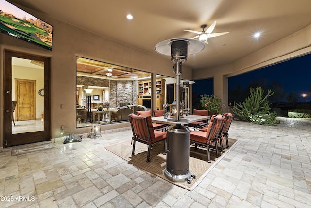 13249 E Summit Dr, Scottsdale, AZ 85259 - dining area featuring a ceiling fan, stone tile flooring, and recessed lighting