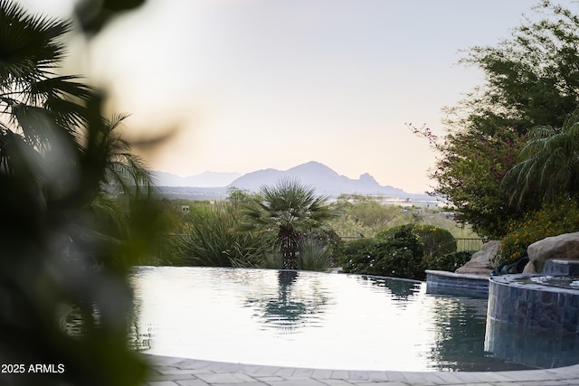 13249 E Summit Dr, Scottsdale, AZ 85259 - view of property's community featuring a mountain view and a swimming pool