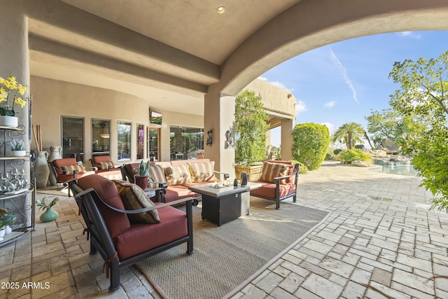 13249 E Summit Dr, Scottsdale, AZ 85259 - view of patio / terrace featuring an outdoor living space with a fire pit and an outdoor pool