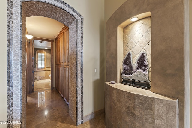 13249 E Summit Dr, Scottsdale, AZ 85259 - corridor with arched walkways and baseboards