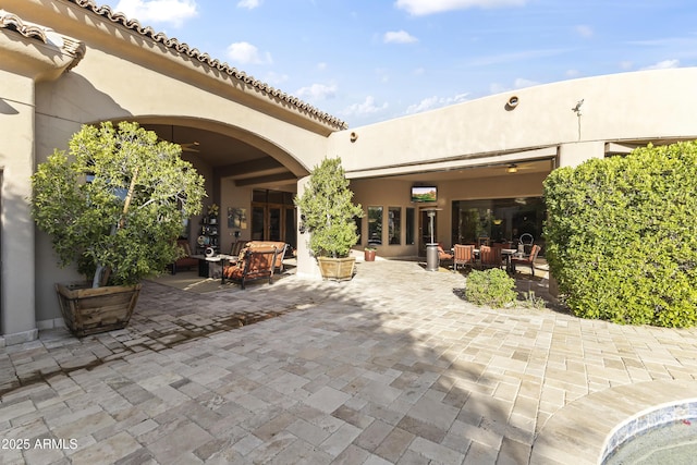 13249 E Summit Dr, Scottsdale, AZ 85259 - rear view of property with stucco siding and a patio area