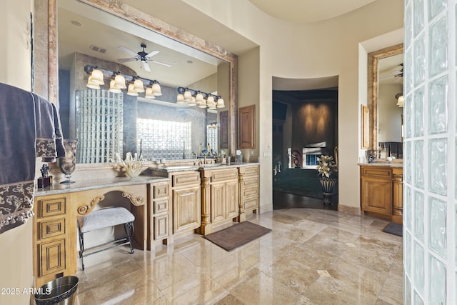 13249 E Summit Dr, Scottsdale, AZ 85259 - bathroom with a ceiling fan and vanity