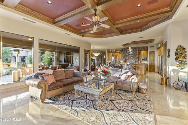 13249 E Summit Dr, Scottsdale, AZ 85259 - living room featuring a ceiling fan, coffered ceiling, crown molding, beam ceiling, and light marble finish floors