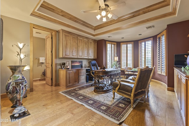 13249 E Summit Dr, Scottsdale, AZ 85259 - office space with a tray ceiling, a ceiling fan, light wood-style flooring, baseboards, and crown molding