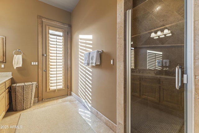 13249 E Summit Dr, Scottsdale, AZ 85259 - bathroom featuring vanity, baseboards, and a shower stall