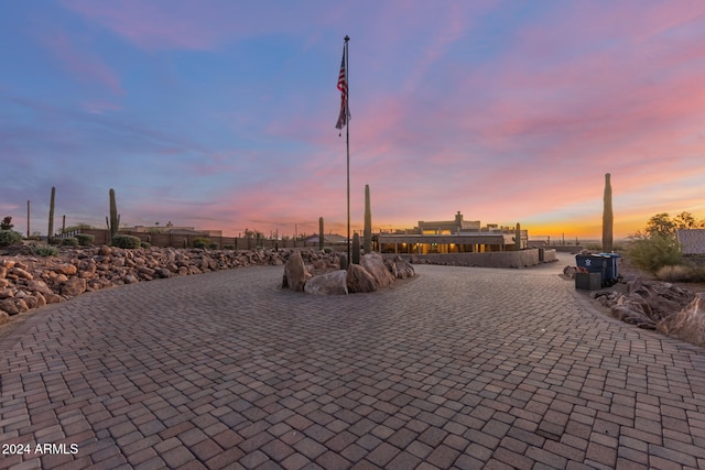 view of patio terrace at dusk