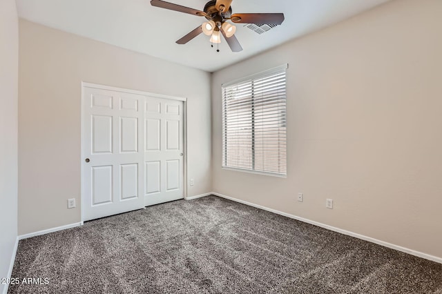 8766 W Hayward Ave, Glendale, AZ 85305 - unfurnished bedroom with carpet floors, baseboards, a closet, and ceiling fan