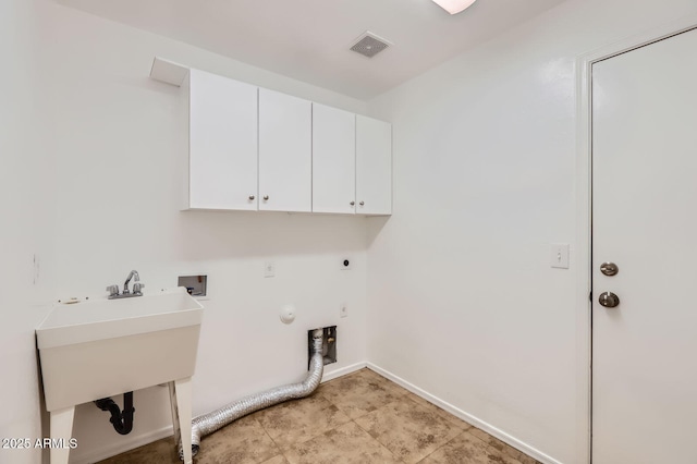 8766 W Hayward Ave, Glendale, AZ 85305 - clothes washing area featuring cabinet space, electric dryer hookup, gas dryer hookup, washer hookup, and baseboards