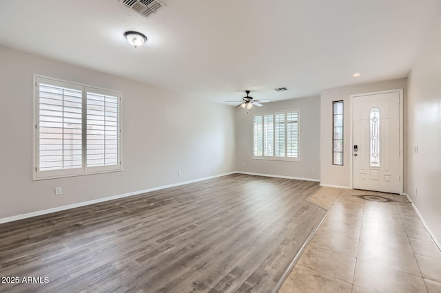 8766 W Hayward Ave, Glendale, AZ 85305 - foyer featuring a ceiling fan, baseboards, and wood finished floors