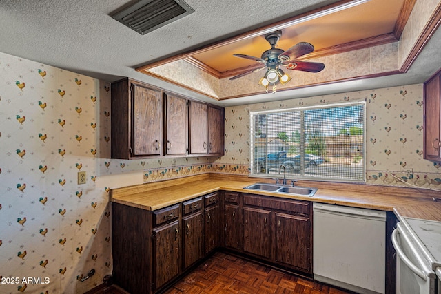 6015 W Acoma Dr, Glendale, AZ 85306 - kitchen with white appliances, wallpapered walls, a textured ceiling, light countertops, and ceiling fan