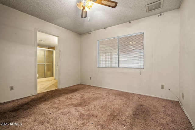 6015 W Acoma Dr, Glendale, AZ 85306 - empty room featuring carpet floors, a ceiling fan, and a textured ceiling