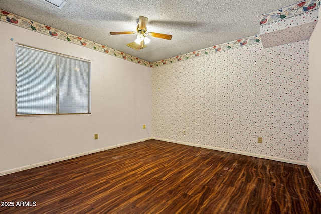 6015 W Acoma Dr, Glendale, AZ 85306 - empty room with wood finished floors, a textured ceiling, and ceiling fan