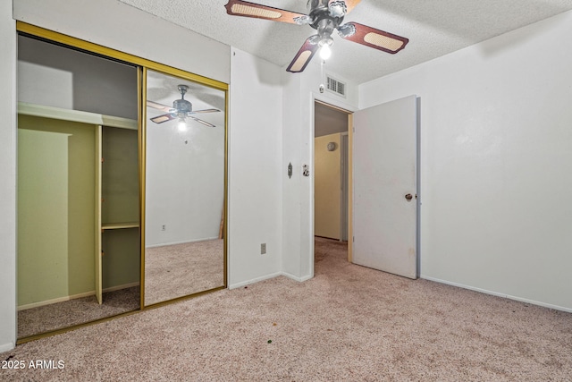 6015 W Acoma Dr, Glendale, AZ 85306 - unfurnished bedroom with carpet flooring, a textured ceiling, a ceiling fan, and a closet