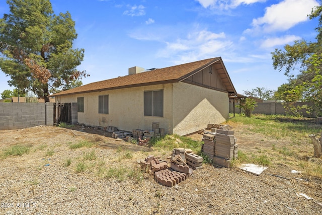 6015 W Acoma Dr, Glendale, AZ 85306 - view of home's exterior with a chimney and stucco siding