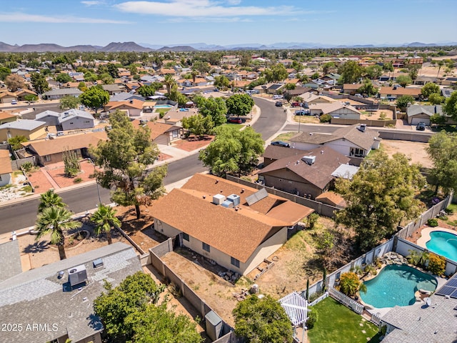 6015 W Acoma Dr, Glendale, AZ 85306 - aerial perspective of suburban area with a pool and mountains