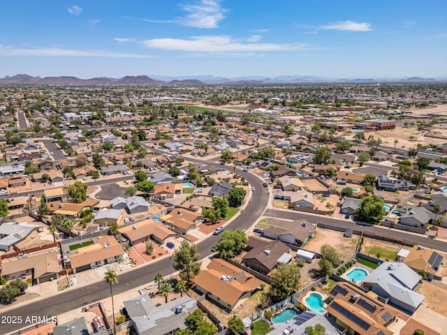 6015 W Acoma Dr, Glendale, AZ 85306 - aerial overview of property's location featuring a mountain backdrop and nearby suburban area