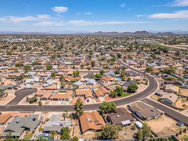 6015 W Acoma Dr, Glendale, AZ 85306 - aerial overview of property's location with mountains and nearby suburban area
