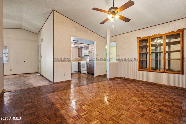 6015 W Acoma Dr, Glendale, AZ 85306 - unfurnished room with vaulted ceiling, a ceiling fan, and a textured ceiling