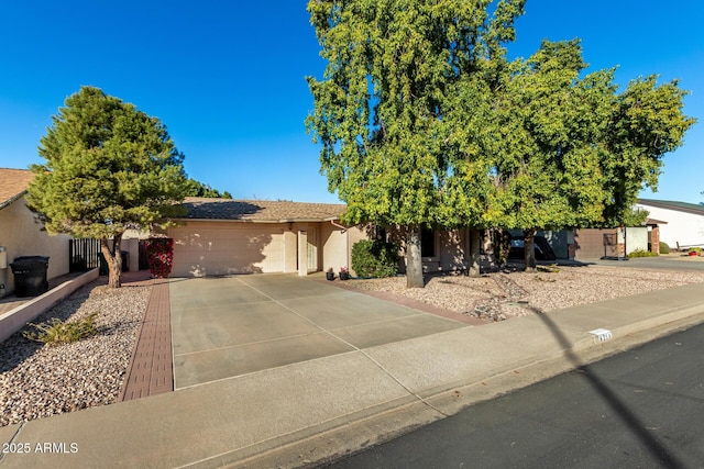 obstructed view of property featuring a garage