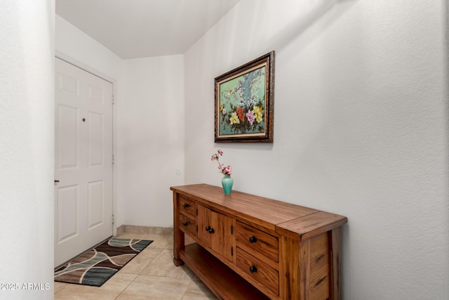 entrance foyer featuring light tile patterned flooring