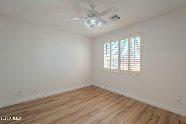 125 N 22nd Pl Unit 5, Mesa, AZ 85213 - unfurnished room featuring light wood-type flooring and a ceiling fan