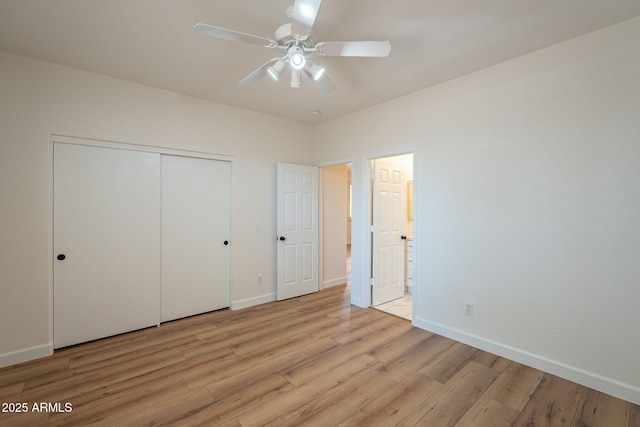 125 N 22nd Pl Unit 5, Mesa, AZ 85213 - unfurnished bedroom featuring light wood-style flooring, a closet, and a ceiling fan