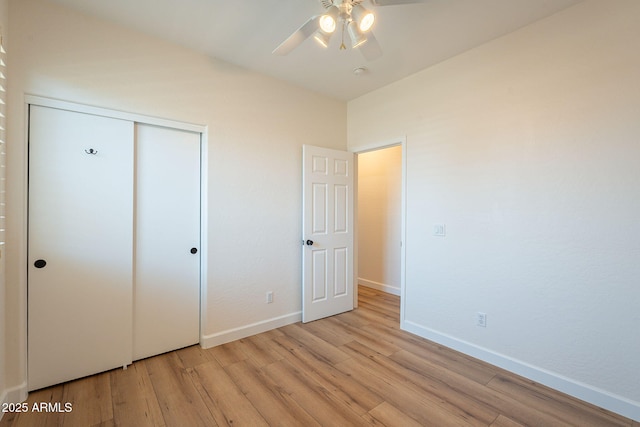 125 N 22nd Pl Unit 5, Mesa, AZ 85213 - unfurnished bedroom featuring light wood-type flooring, a closet, and a ceiling fan