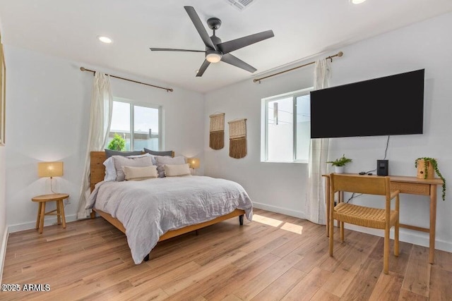 bedroom featuring baseboards, a ceiling fan, recessed lighting, and light wood-type flooring