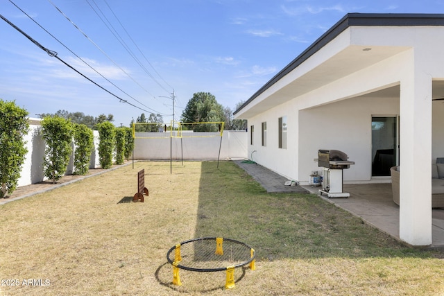 view of yard featuring a patio and a fenced backyard