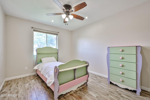 7125 W Canterbury Dr, Peoria, AZ 85345 - bedroom featuring wood finished floors, baseboards, a ceiling fan, and recessed lighting