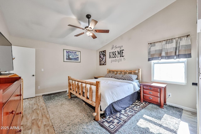 7125 W Canterbury Dr, Peoria, AZ 85345 - bedroom featuring vaulted ceiling, light wood-type flooring, baseboards, and a ceiling fan