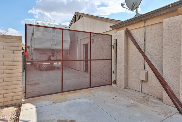 7125 W Canterbury Dr, Peoria, AZ 85345 - gate featuring a patio and fence