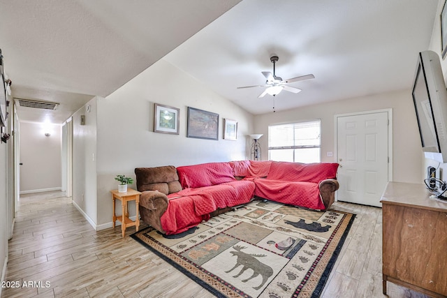7125 W Canterbury Dr, Peoria, AZ 85345 - living area with light wood-type flooring, ceiling fan, and baseboards
