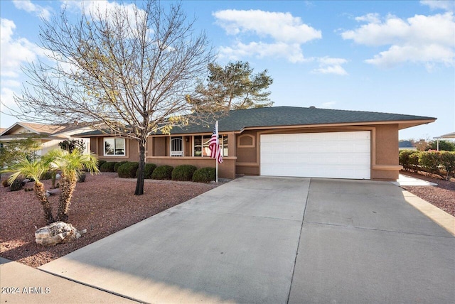 ranch-style home with a garage