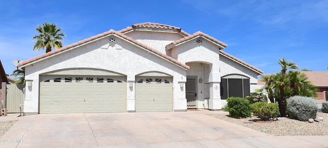 520 E Appaloosa Rd, Gilbert, AZ 85296 - mediterranean / spanish-style house featuring an attached garage, stucco siding, a tiled roof, and concrete driveway