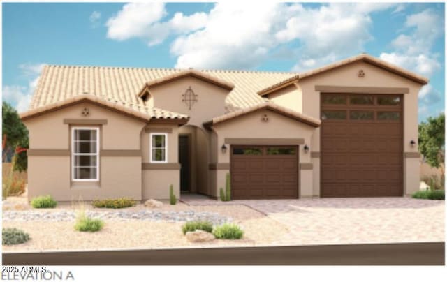 20262 W Monterey Way, Buckeye, AZ 85396 - mediterranean / spanish-style home with a garage, stucco siding, and driveway