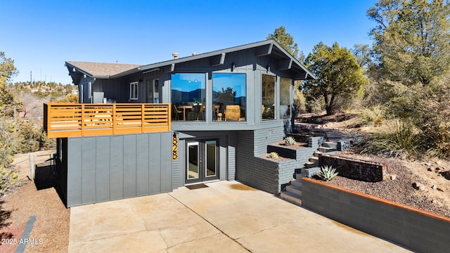 contemporary house with a patio